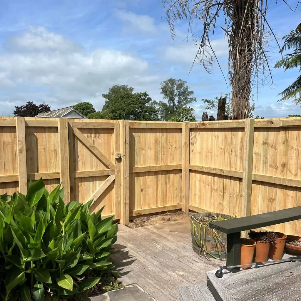 Repaired residential fence after damage in Hamilton